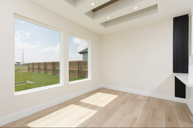 Interior room with tray ceiling