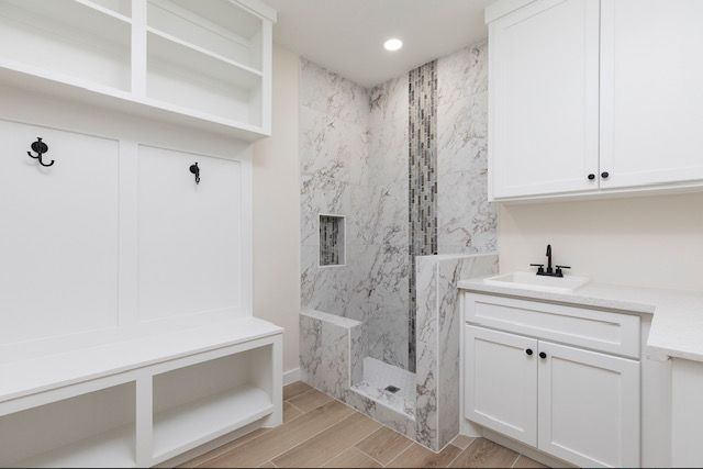 Mudroom bench, dog wash, and laundry sink