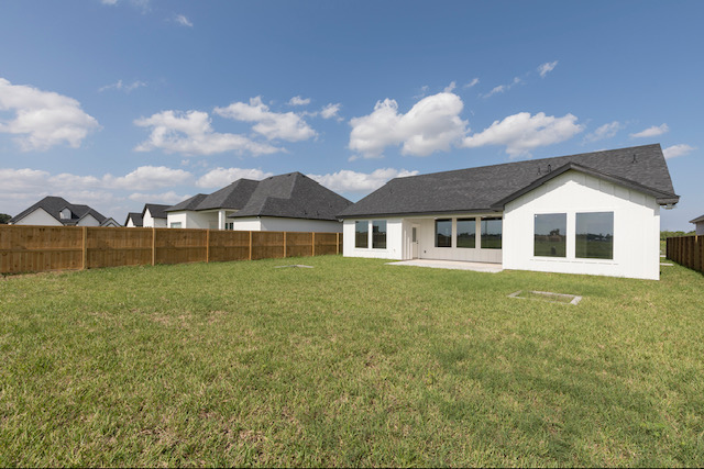Rear elevation and lawn, Alamo farmhouse
